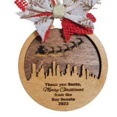 Ornament Santa Flies Over City